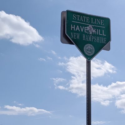 New Hampshire State Line Sign